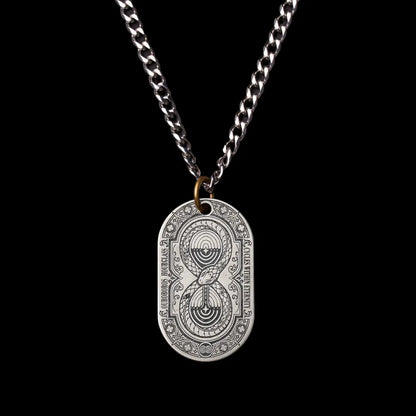 Ouroboros Hourglass Tag SKU image 1 in silver-tone finish; attachment examples are not included