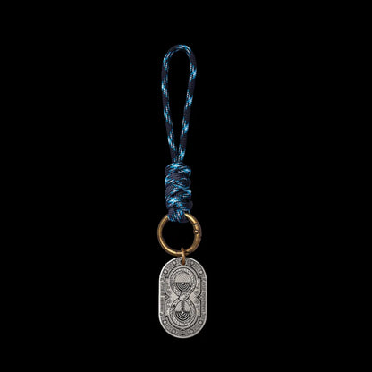 Ouroboros Hourglass Tag SKU image 2 in silver-tone finish; attachment examples are not included