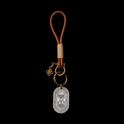 Ouroboros Hourglass Tag SKU image 3 in silver-tone finish; attachment examples are not included