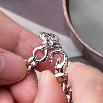 Ouroboros Infinity Bracelet silver-finish clasp and fit detail