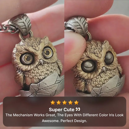 Owl fidget pendant blinking eyes close up