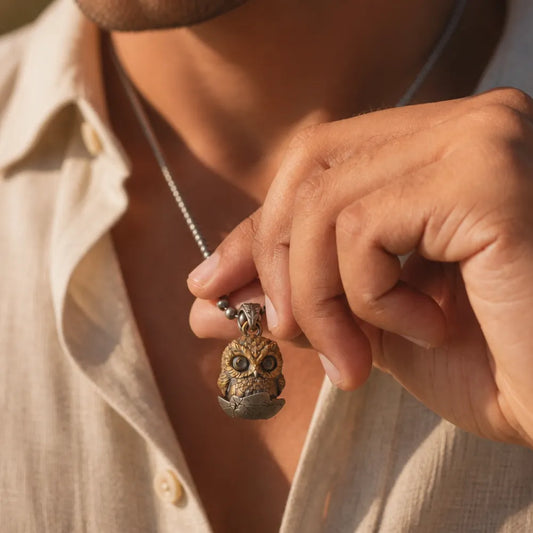 Owl fidget pendant worn as a statement necklace by a woman