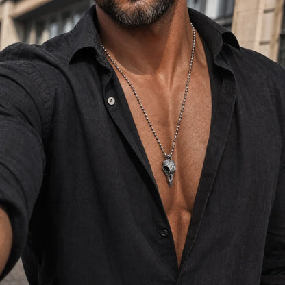 White Bronze Raven Skull Pendant styled with a black shirt
