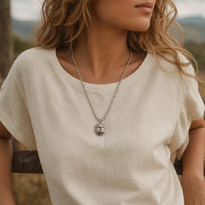 Woman wearing the White Bronze Scarab Pendant