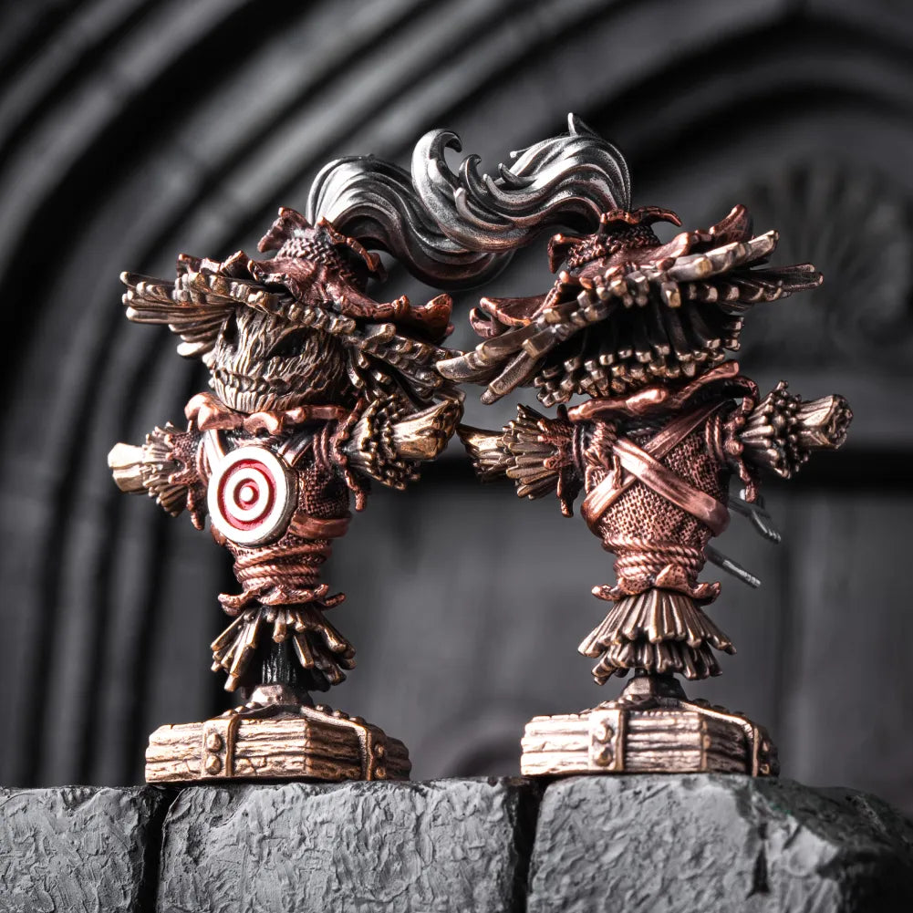 Two handcrafted metal Scarecrow Training Dummy figurines with magnetic bullseyes