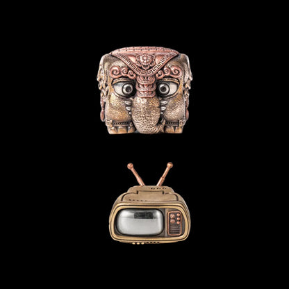 Six-Tusked Elephant figurine with a television base on a black background