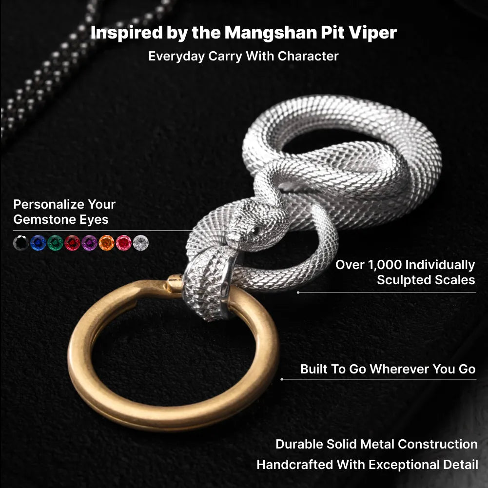 Snake Keychain in 18K White Gold Plated White Bronze, sculpted scales, gemstone eyes and solid-metal design shown in an infographic.