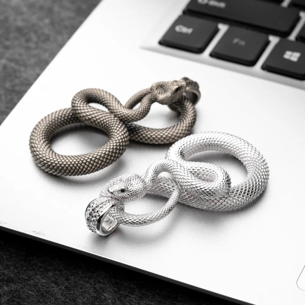 Snake Keychain in 18K White Gold Plated White Bronze, multiple finishes arranged in a flat-lay comparison.