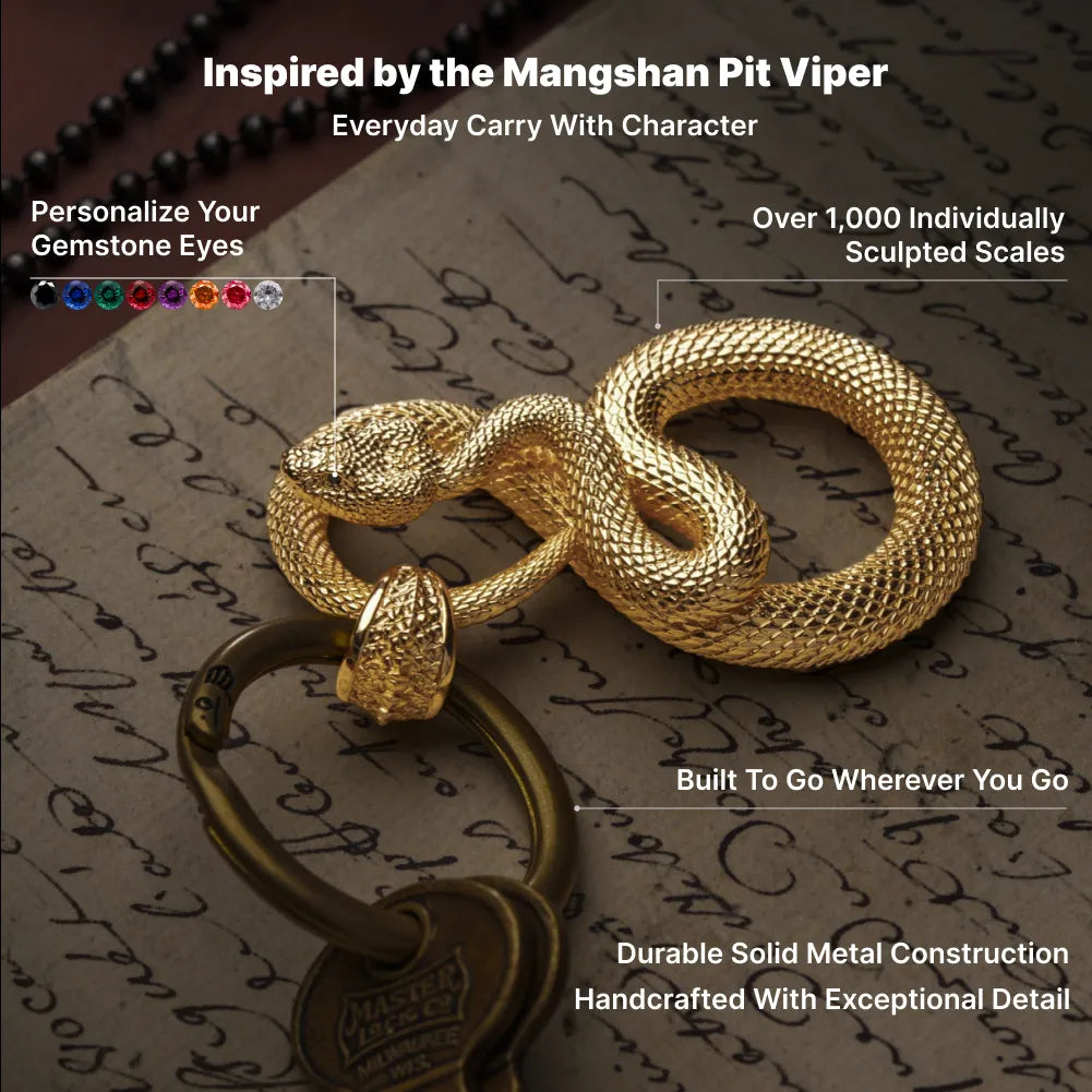 Snake Keychain in 24K Gold Plated Brass, sculpted scales, gemstone eyes and solid-metal design shown in an infographic.