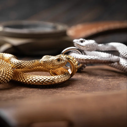 Snake Keychain in 24K Gold Plated Brass, multiple finish variants arranged in a product display.