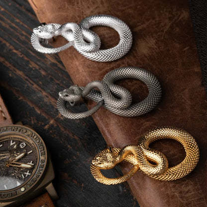 Snake Keychain in 24K Gold Plated Brass, shown beside a wristwatch in a product close-up.