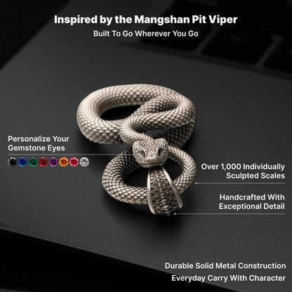 Snake Keychain in White Bronze, sculpted scales, gemstone eyes and solid-metal design shown in an infographic.