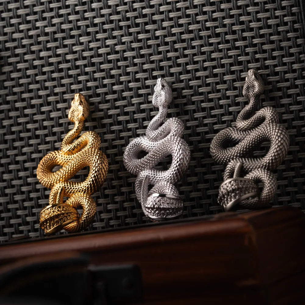 Snake Pendant in 18K White Gold Plated White Bronze, multiple finishes arranged in a flat-lay comparison.