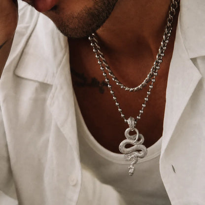 Snake Pendant in 18K White Gold Plated White Bronze, worn as a necklace in a lifestyle view.