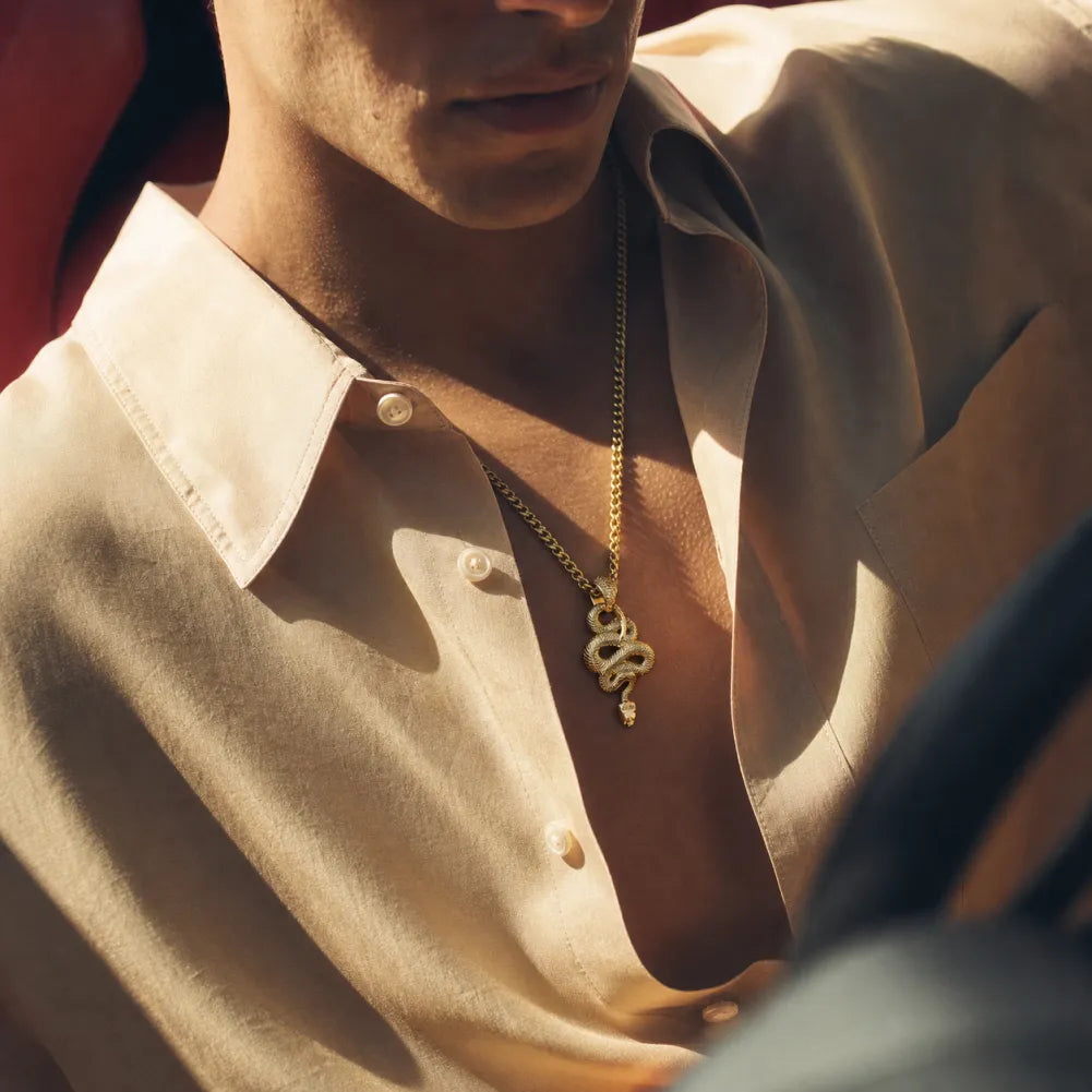 Snake Pendant in 24K Gold Plated Brass, worn as a necklace in a lifestyle view.