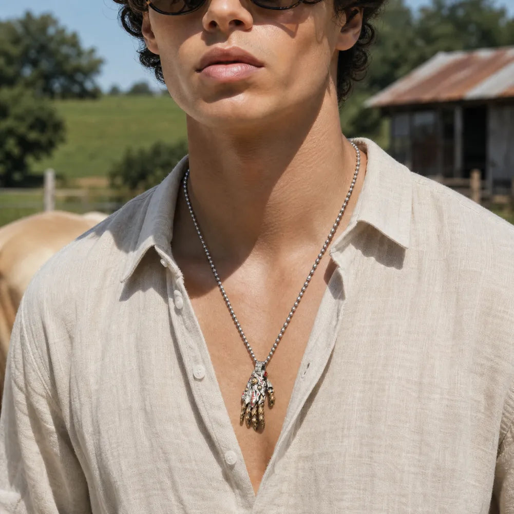 Taoist Mechanical Hand Pendant worn with a resort shirt
