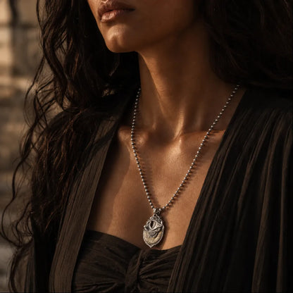 White Bronze and Brass Tarot Vision Pendant on a woman
