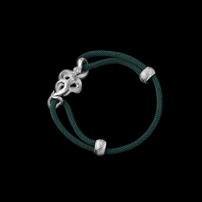 Tree Boa rope bracelet in 18K White Gold Plated White Bronze with 4mm Milan Rope and Dark Green cord, black-background variant view
