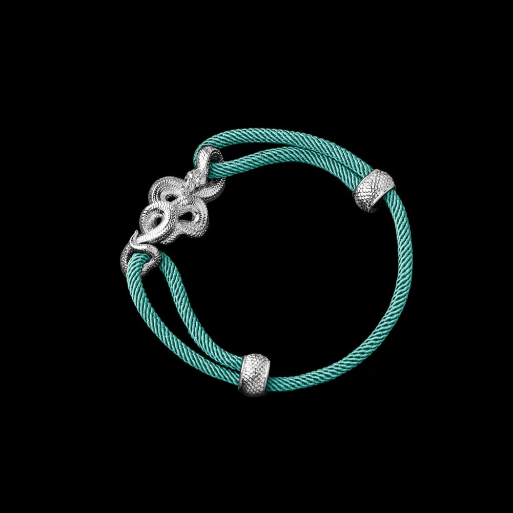 Tree Boa rope bracelet in 18K White Gold Plated White Bronze with 4mm Milan Rope and Light Blue cord, black-background variant view
