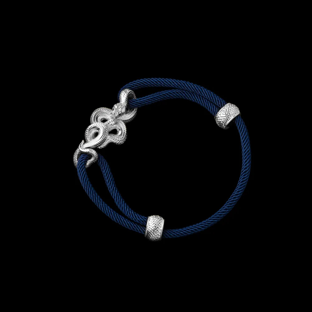 Tree Boa rope bracelet in 18K White Gold Plated White Bronze with 4mm Milan Rope and Navy Blue cord, black-background variant view
