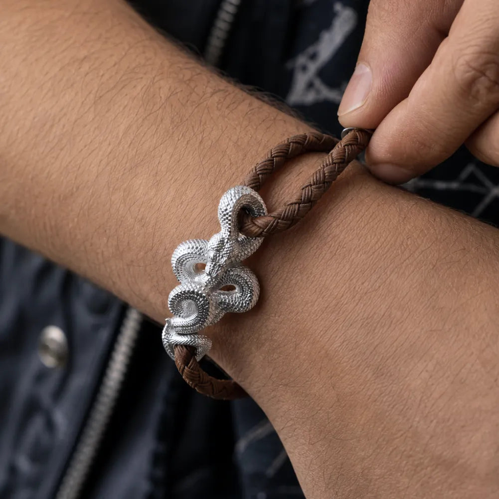 Tree Boa Rope Bracelet in 18K White Gold Plated White Bronze, cord adjustment and snake clasp shown close up on the wrist.