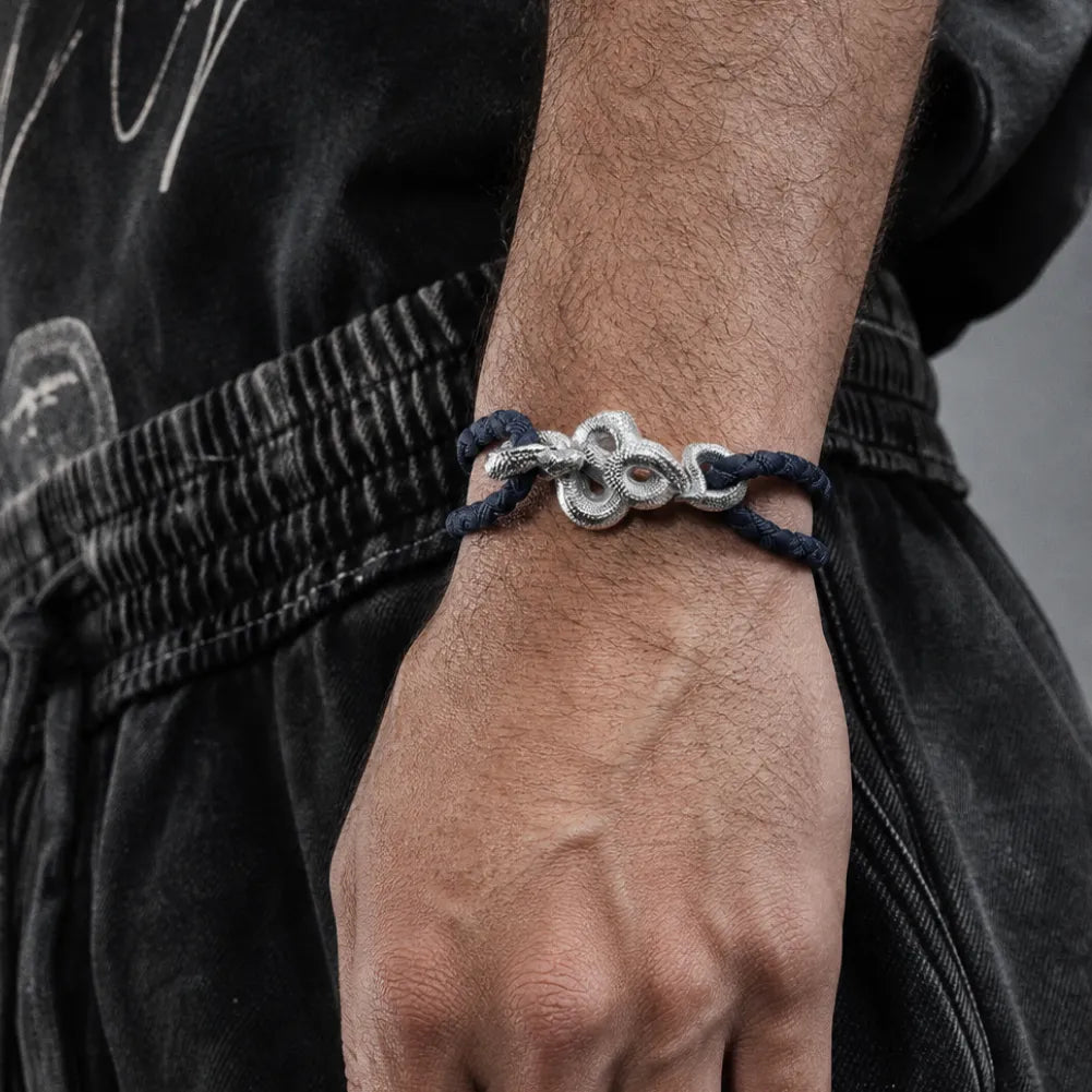 Tree Boa Rope Bracelet in 18K White Gold Plated White Bronze, worn on the wrist in a side view.