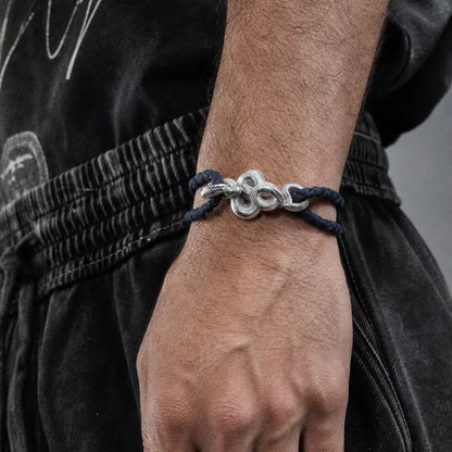 Tree Boa Rope Bracelet in 18K White Gold Plated White Bronze, worn on the wrist in a side view.