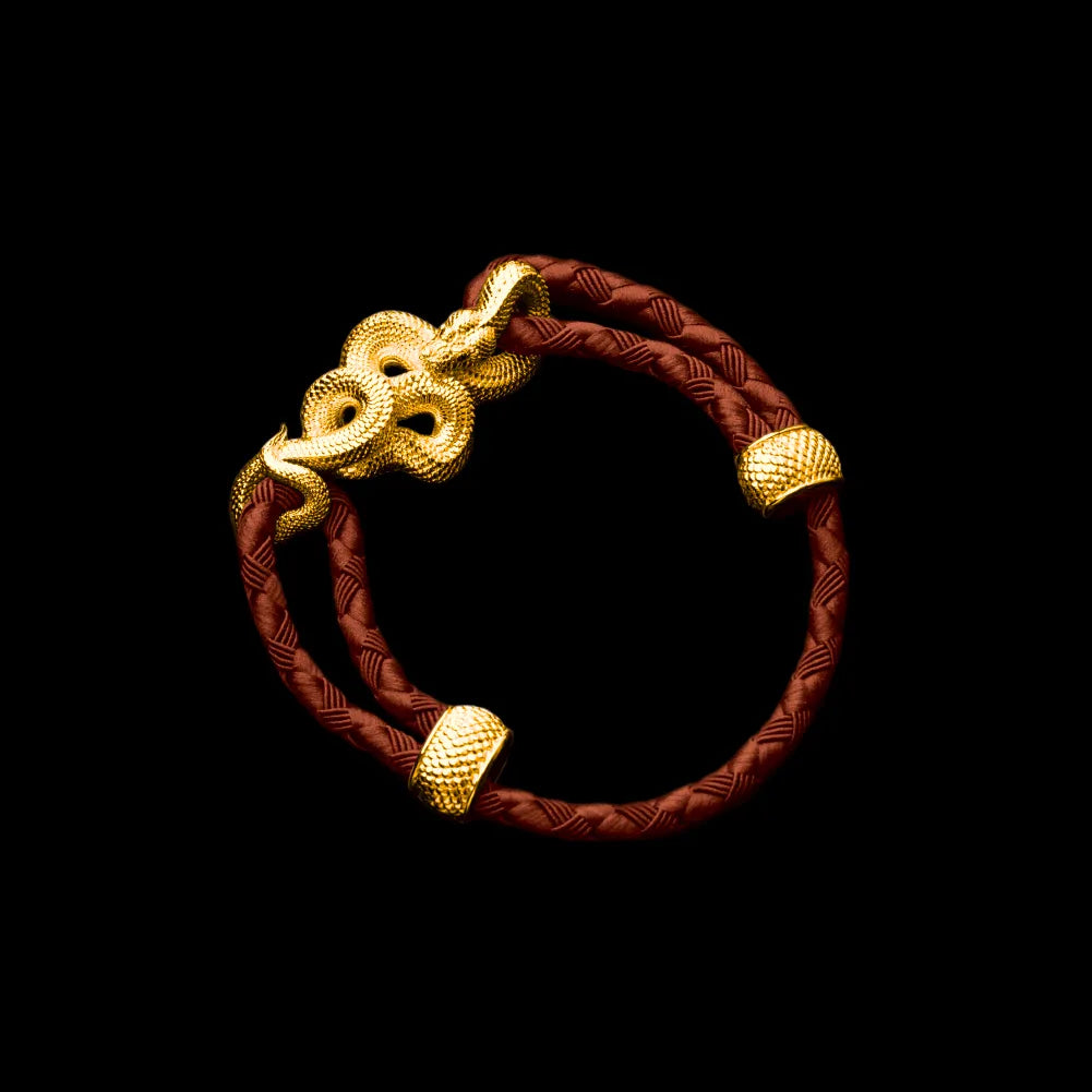 Tree Boa rope bracelet in 24K Gold Plated Brass with 4mm Braided Rope and & Deep Orange cord, black-background variant view