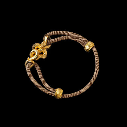 Tree Boa rope bracelet in 24K Gold Plated Brass with 4mm Milan Rope and Light Khaki cord, black-background variant view