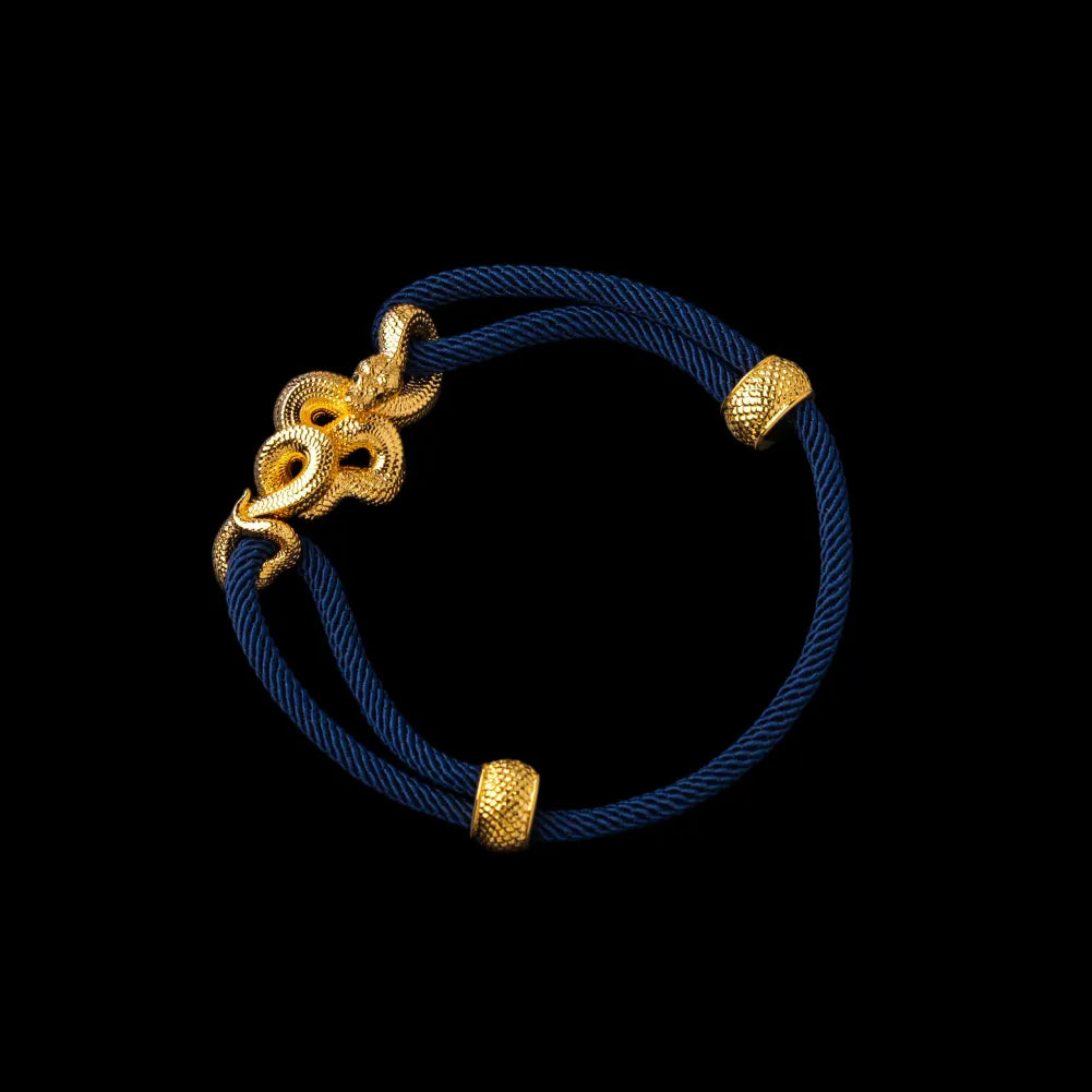 Tree Boa rope bracelet in 24K Gold Plated Brass with 4mm Milan Rope and Navy Blue cord, black-background variant view