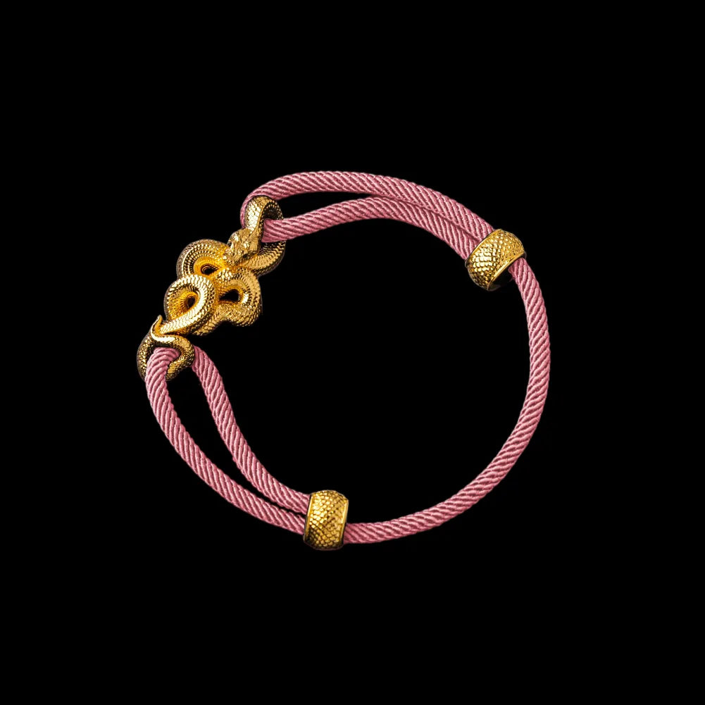 Tree Boa rope bracelet in 24K Gold Plated Brass with 4mm Milan Rope and Strawberry Cream cord, black-background variant view