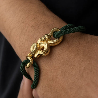 Tree Boa Rope Bracelet in 24K Gold Plated Brass, cord adjustment and snake clasp shown close up on the wrist.