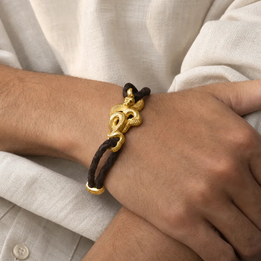 Tree Boa Rope Bracelet in 24K Gold Plated Brass, worn on the wrist in a front view.