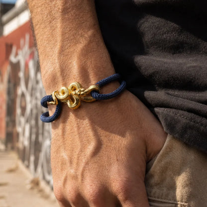 Tree Boa Rope Bracelet in 24K Gold Plated Brass, worn on the wrist in a lifestyle close-up.