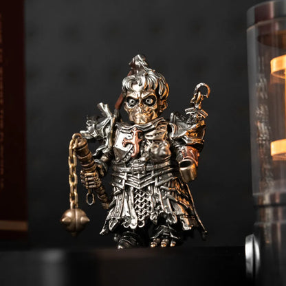 Risen Corpse Undead Crusader holding a chained morning star on a desk