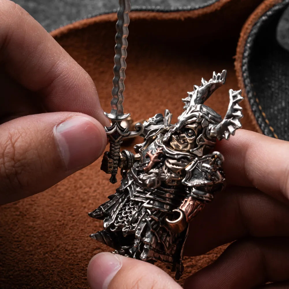 Fallen Crusader head and sword being attached to the magnetic knight figure