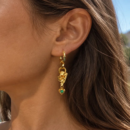 Wild Card Earrings gold-finish side view worn