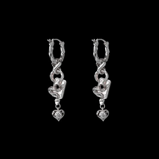 Wild Card Earrings in Silver — pair
