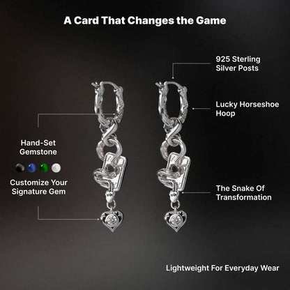 Silver-tone Wild Card Earrings design graphic showing snake charms, horseshoe hoops and four gemstone color options: black, blue, green and white
