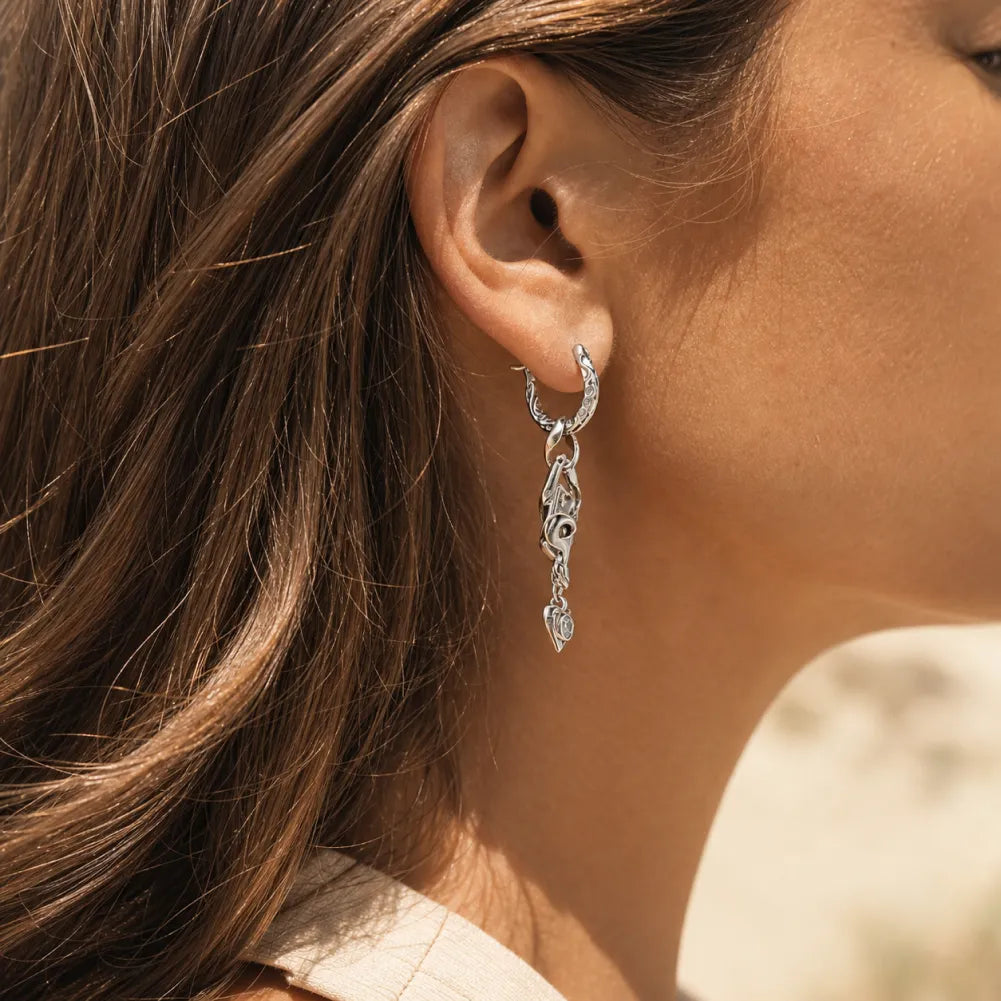 Wild Card Earrings white-finish side view worn
